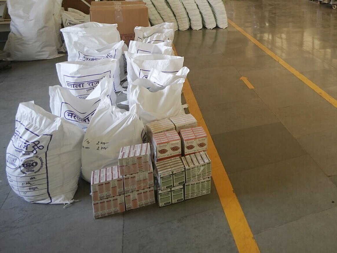 Branded Masala Raaj export sacks and retail cartons staged on the dispatch lane, Nagaur facility